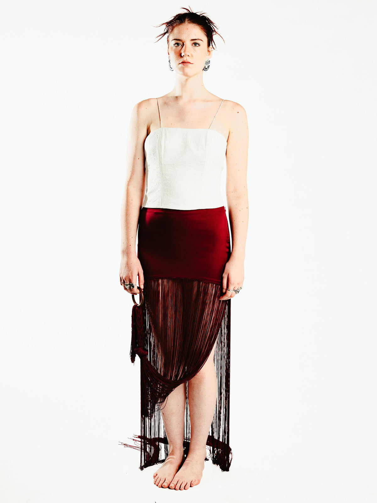 Red fringe skirt with wooden bangle