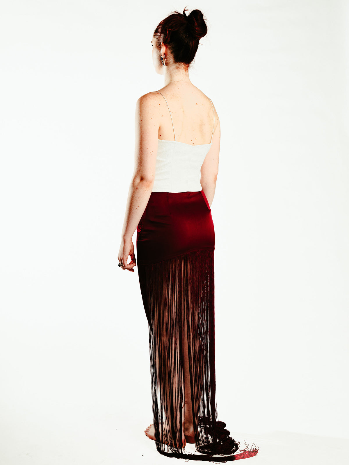Red fringe skirt with wooden bangle