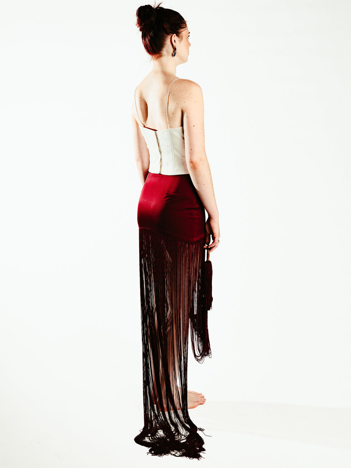 Red fringe skirt with wooden bangle