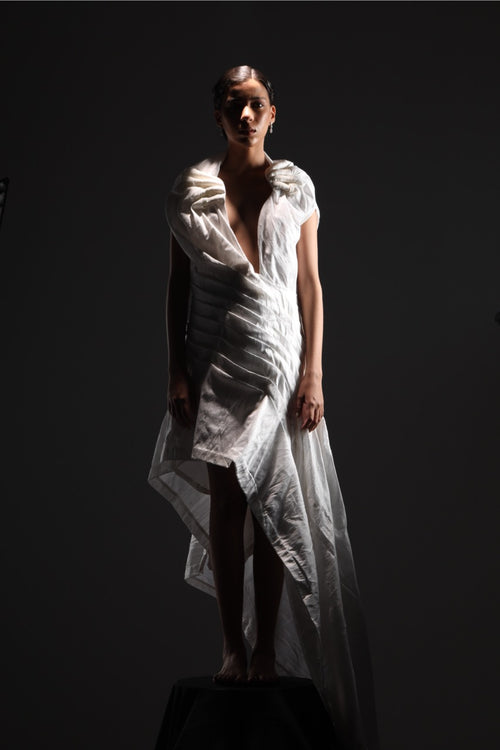 Asymmetrical avant garde hands gown