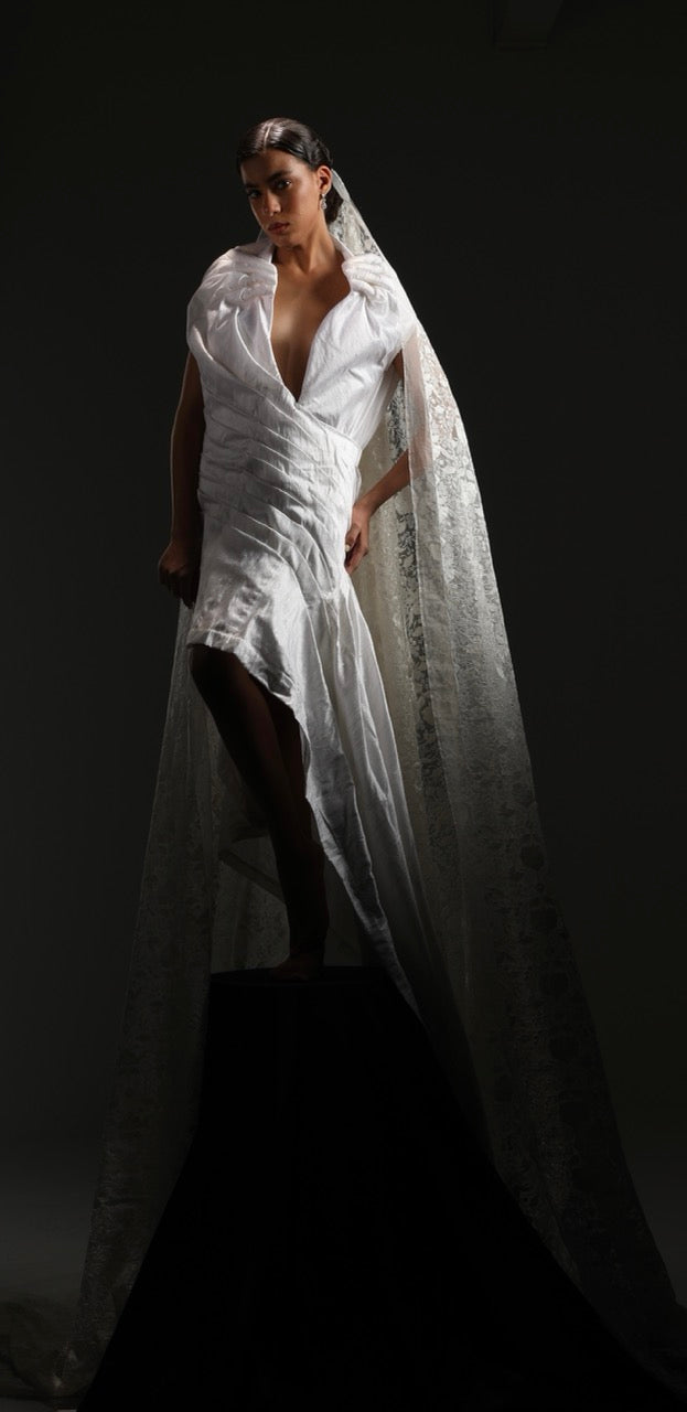 Asymmetrical avant garde hands gown