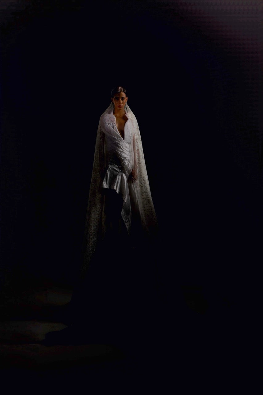 Asymmetrical avant garde hands gown