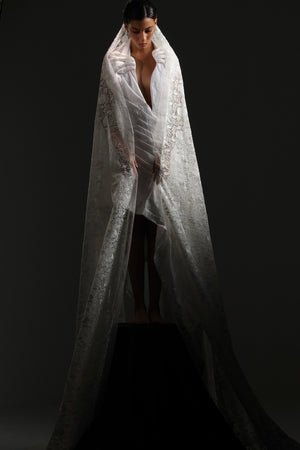 Asymmetrical avant garde hands gown